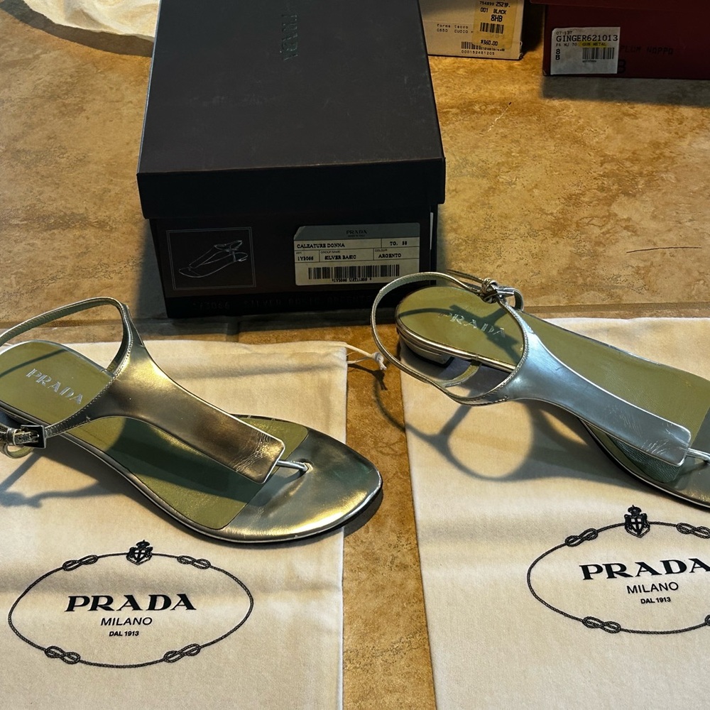 Prada sandals bottoms are worn but the shoes are great still